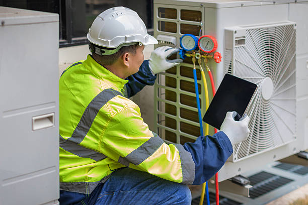 Professional Heat Pump Repair technician working in Savage, MD